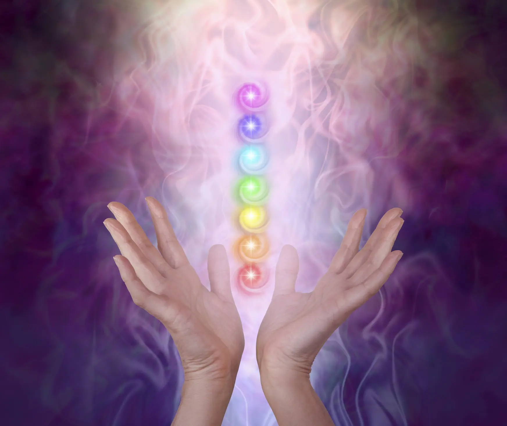 Spiritual energy radiating from open hands