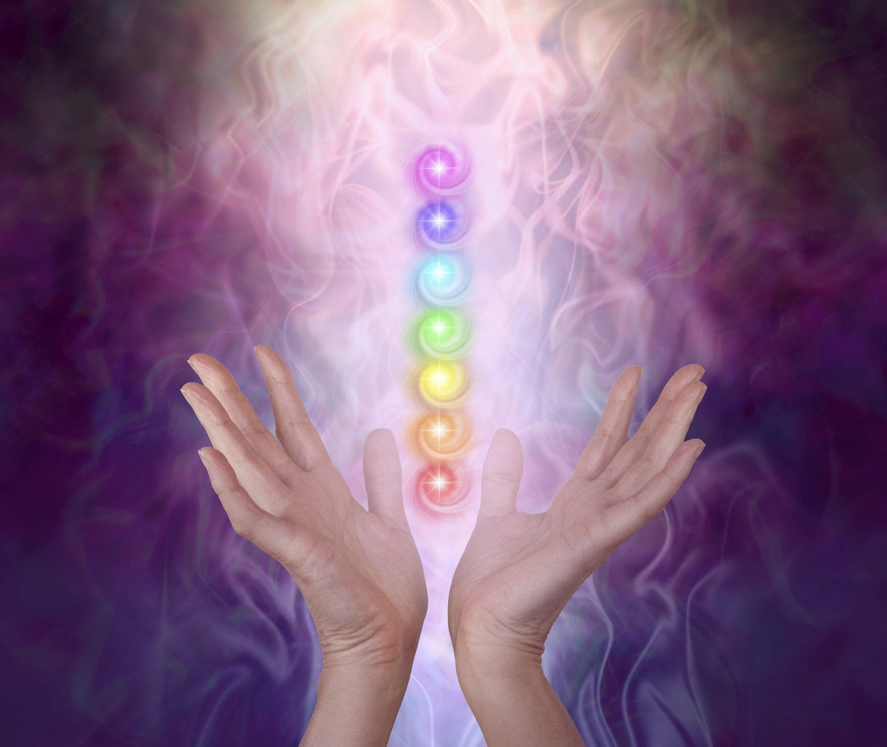 Spiritual energy radiating from open hands